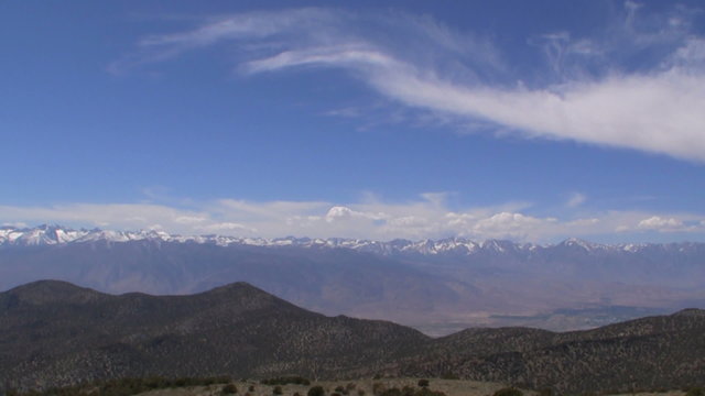 Time lapse footage of heavenly cloudscape over alpine mountain peaks of Sierra Nevada Mountains in California