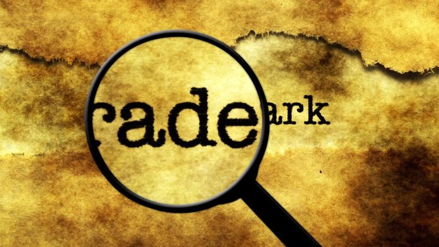 Magnifying glass on  trademark