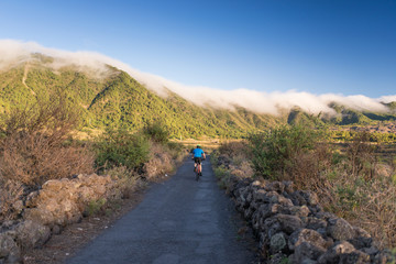 Rider through mountain way