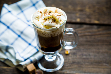 Black coffee with whipped cream