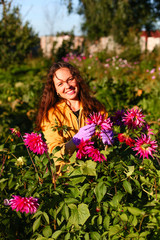 Naklejka premium Young woman in garden.