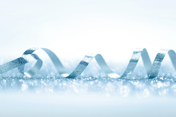 Shiny blue ribbon curls