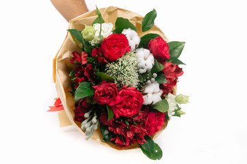 Red bouquet of roses,  alstroemeria, trachelium and brunia