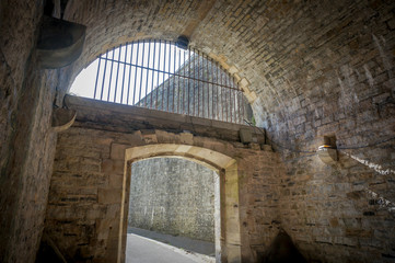 Fototapeta na wymiar Bayonne, city rampart monument, exit gate with iron bars