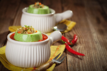 Stuffed zucchini on dark background