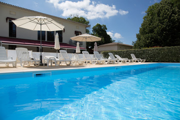 Private swimming pool at summertime