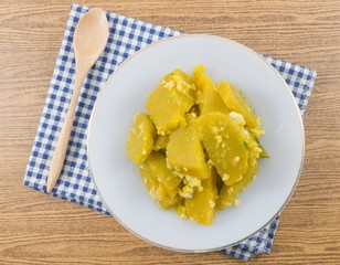 Stir Fried Pumpkin with Egg in White Dish