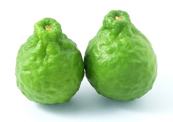 Two Kaffir Lime Fruits on White Background