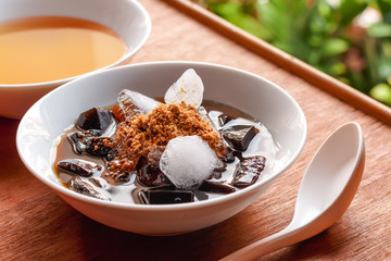 grass jelly dessert, herbal gelatin, Chinese style.