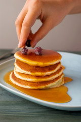 Stack of pancakes with fresh blueberry