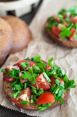 Italian tomato bruschetta with chopped vegetables, herbs and oil