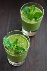 fresh homemade smoothie with spinach and bananas