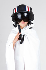 Cool kid posing wearing all white and flight helmet with