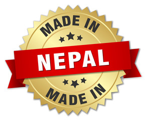 made in Nepal gold badge with red ribbon