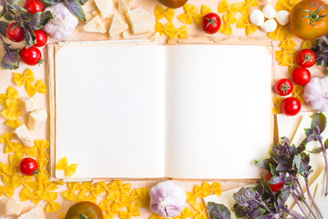 Old blank recipe book with italian food ingredients