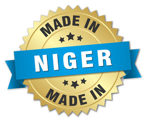made in Niger gold badge with blue ribbon