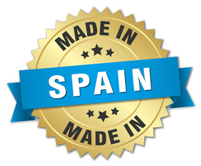 made in Spain gold badge with blue ribbon