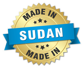 made in Sudan gold badge with blue ribbon