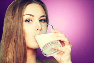 Drinking milk.