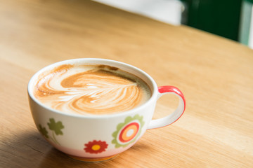 Hot Coffee Art on wood table.