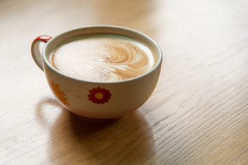 Hot Coffee Art on wood table.