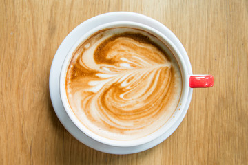 Hot Coffee Art on wood table.