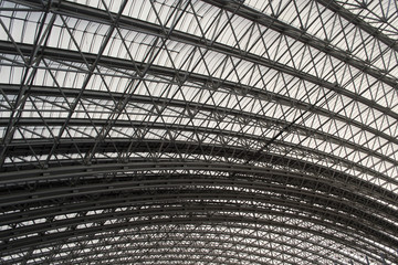 Metal beam supported stadium roof