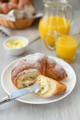 delicious breakfast with fresh croissants and orange juice