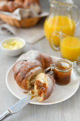 delicious breakfast with fresh croissants and orange juice