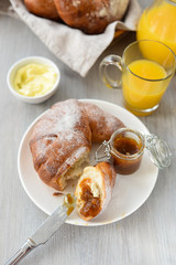 delicious breakfast with fresh croissants and orange juice