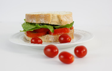 tomatoes sandwich on a white background 