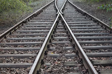 Foto op Plexiglas splijtspoor, dubbelsporige spoorlijn, spoorrails © hanohiki