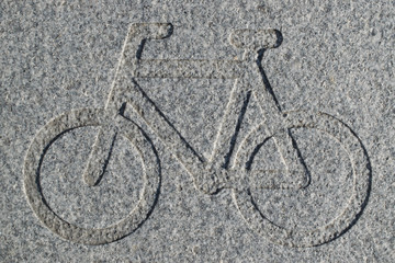 Bike lane sign engraved in granite