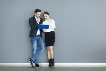 Young couple working in the office