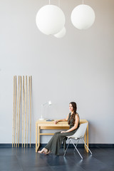 Pretty young woman in the room