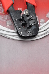 Obraz premium Crimping tool with network cable and connectors