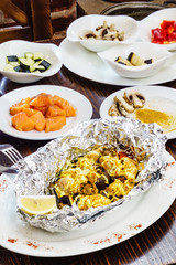 fish with vegetables in the foil