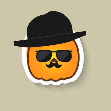 Pumpkin hipster in sunglasses and bowler hat