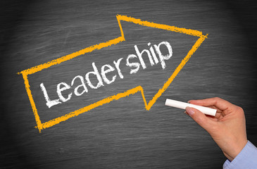 Leadership arrow with text on chalkboard