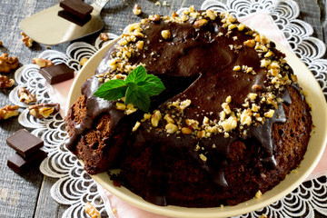 Chocolate cake with nuts in a rustic style