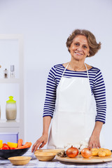 Senior woman cooking