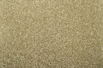 Gold background with metallic glitter texture in full frame