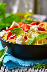 Spaghetti with bell pepper and brynza.