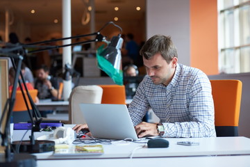 Obraz na płótnie Canvas startup business, software developer working on computer