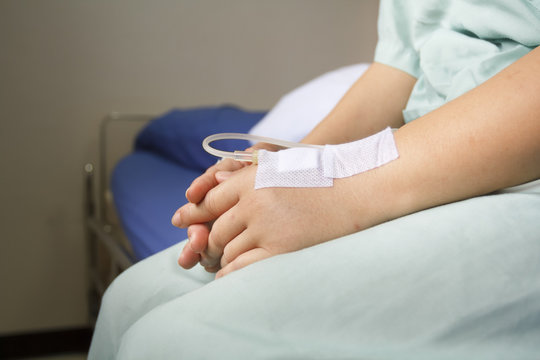 woman patient in hospital with saline intravenous (iv)