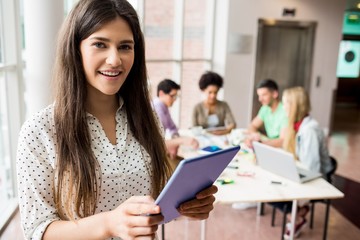 Student working on assignment with tablet