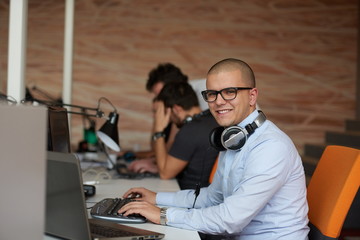 startup business, software developer working on computer