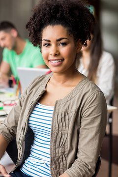 Pretty student smiling at camera