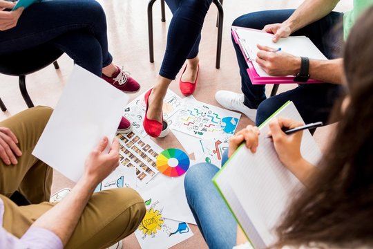 Students sitting in circle working together