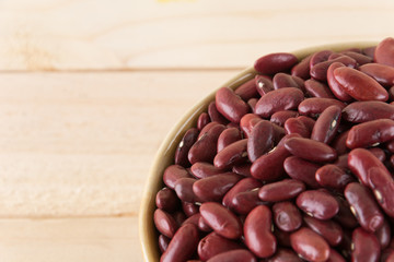 red  beans on wood background
